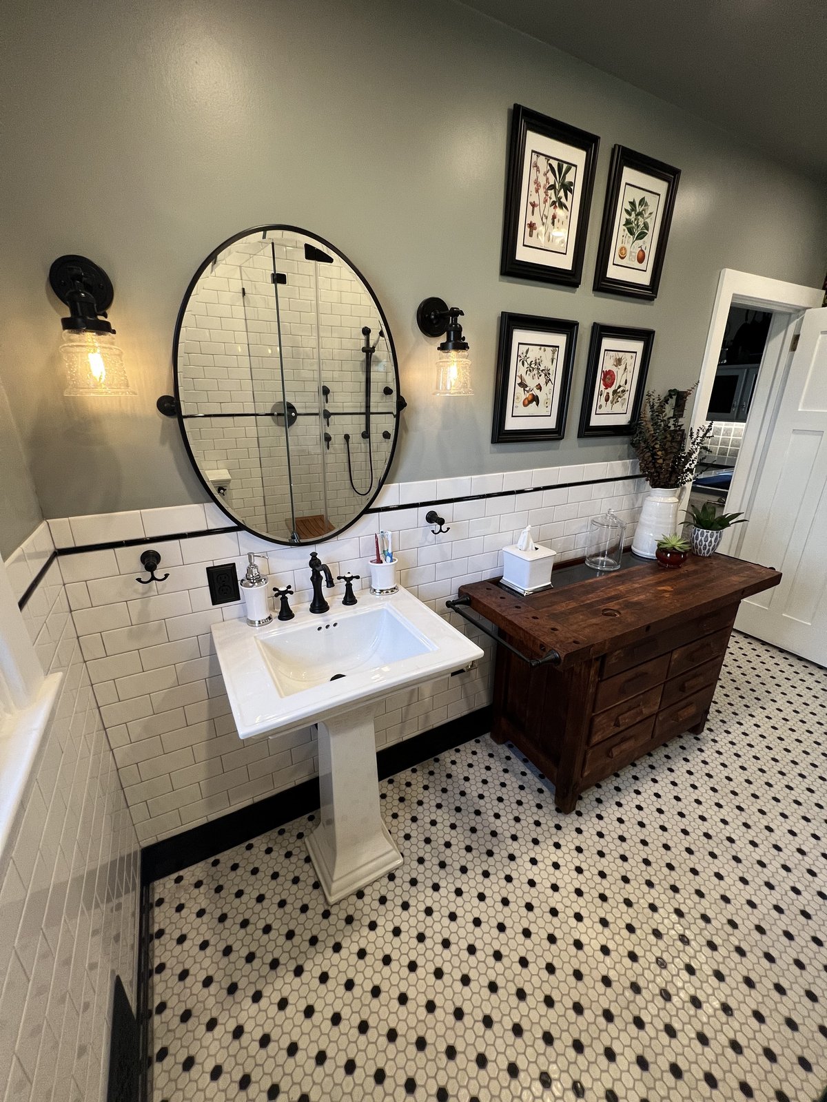 Custom bathroom remodel with pedestal sink and penny-tile floor, West Chester PA